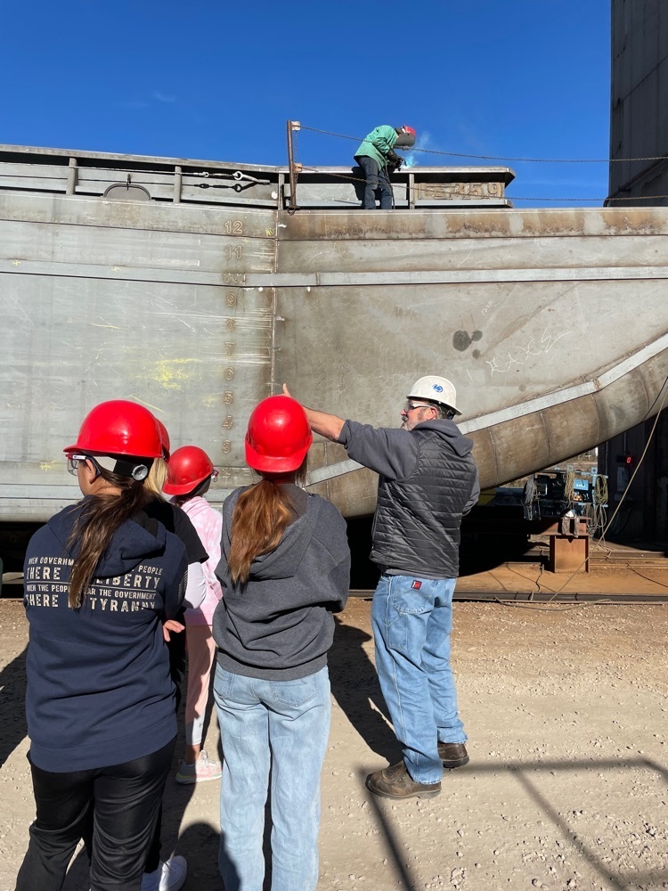 Students lean about the different types of barges.  