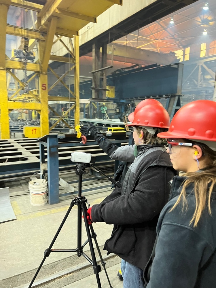 Students collect video footage inside the plant. 